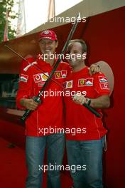 10.09.2004 Monza, Italy F1, Friday, September, Olympus Event in the evening - Michael Schumacher, GER, Ferrari  and Rubens Barrichello, BRA, Ferrari - Formula 1 World Championship, Rd 15, Italian Grand Prix, ITA, Italy