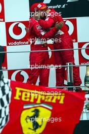 12.09.2004 Monza, Italy F1, Sunday, September, Michael Schumacher, GER, Ferrari, Rubens Barrichello, BRA, Ferrari - Formula 1 World Championship, Podium, Rd 15, Italian Grand Prix, ITA, Italy