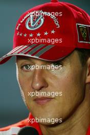 09.09.2004 Monza, Italy, F1, Thursday, September, Michael Schumacher, GER, Ferrari with his new 7 times world champion baseball cap - Official FIA Press Conference, Formula 1 World Championship, Rd 15, Italian Grand Prix, ITA, Italy