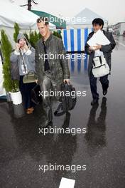 08.10.2004 Suzuka, Japan, F1, Friday, October, Michael Schumacher, GER, Ferrari arrives at the circuit whilst it is raining - Formula 1 World Championship, Rd 17, Japanese Grand Prix, JPN, Japan, Practice