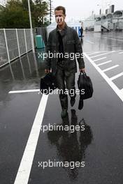 08.10.2004 Suzuka, Japan, F1, Friday, October, Michael Schumacher, GER, Ferrari arrives at the circuit whilst it is raining - Formula 1 World Championship, Rd 17, Japanese Grand Prix, JPN, Japan, Practice