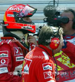 23.05.2004 Monte Carlo, Monaco, F1, Sunday, May, after his crash, Michael Schumacher, GER, Scuderia Ferrari Marlboro, F2004, Action, Track, comes back in the box, Pitlane to finish the race, with Jean Todt, FRA, Ferrari, Teamchief, General Manager, GES - Formula 1 World Championship, Rd 6, Monaco Grand Prix, Race,  MCO