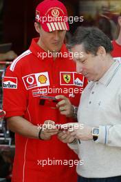 19.05.2004 Monte Carlo, Monaco, F1, Wednesday, May, Michael Schumacher, GER, Ferrari and Jean Todt, FRA, Ferrari, Teamchief, General Manager, GES - Formula 1 World Championship, Rd 6, Monaco Grand Prix, MCO