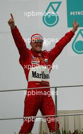 21.03.2004 Sepang, Malaysia, F1, Sunday, March, Michael Schumacher, GER, Ferrari, Formula 1 World Championship, Podium, Rd 2, Malaysian Grand Prix, KUL, Kuala Lumpur