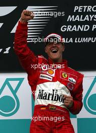 21.03.2004 Sepang, Malaysia, F1, Sunday, March, Michael Schumacher, GER, Ferrari, Portrait, Formula 1 World Championship, Podium, Rd 2, Malaysian Grand Prix, KUL, Kuala Lumpur