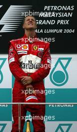 21.03.2004 Sepang, Malaysia, F1, Sunday, March, Michael Schumacher, GER, Ferrari, Portrait, Formula 1 World Championship, Podium, Rd 2, Malaysian Grand Prix, KUL, Kuala Lumpur