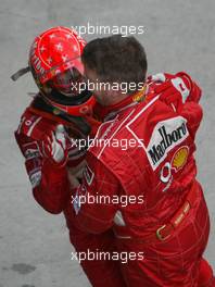 21.03.2004 Sepang, Malaysia, F1, Sunday, March, Michael Schumacher, GER, Ferrari and Ross Brawn, GBR, Ferrari, Technical Director, Portrait, Formula 1 World Championship, Race, Rd 2, Malaysian Grand Prix, KUL, Kuala Lumpur