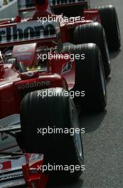 18.03.2004 Sepang, Malaysia, F1, Thursday, March, cars of Michael Schumacher, GER, Ferrari and Rubens Barrichello, BRA, Ferrari in the Pitlane, Feature, tyre, Bridgestone, Formula 1 World Championship, Rd 2, Malaysian Grand Prix, KUL, Kuala Lumpur