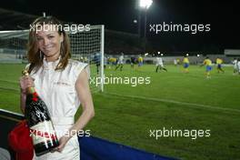 21.04.2004 Forli, Italy, QIS, Charity football match at Stadio Morgani / Forli between current and former F1 drivers, and the Brazilian 1994 Soccer team, A Champagne Mumm Jeroboam which has been signed by the drivers and Brazilians who played in the football match. The Jeroboam will be auctioned for charity. Wednesday, April, Formula 1 World Championship, Rd 4, San Marino Grand Prix, RSM - Mumm Copyright Free