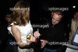 21.04.2004 Forli, Italy, QIS, Charity football match at Stadio Morgani / Forli between current and former F1 drivers, and the Brazilian 1994 Soccer team, Rubens Barrichello, BRA, Ferrari signs  a Champagne Mumm Jeroboam which has been signed by the drivers and Brazilians who played in the football match. The Jeroboam will be auctioned for charity. Wednesday, April, Formula 1 World Championship, Rd 4, San Marino Grand Prix, RSM - Mumm Copyright Free