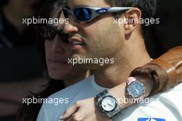 23.04.2004 Imola, San Marino, F1, Friday, April, Connie Montoya, Wife of Juan Pablo Montoya, (wearing two watches, one of JPM during the Practise) and Juan-Pablo Montoya, COL, BMW WilliamsF1 - Practice, Formula 1 World Championship, Rd 4, San Marino Grand Prix, RSM