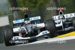 23.04.2004 Imola, San Marino, F1, Friday, April, Gianmaria Bruni, ITA, Wilux Minardi Cosworth, PS04B, Action, Track leads Juan-Pablo Montoya, COL, Juan Pablo, BMW WilliamsF1 Team, FW26, Action, Track - Practice, Formula 1 World Championship, Rd 4, San Marino Grand Prix, RSM