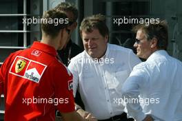 23.04.2004 Imola, San Marino, F1, Friday, April, Michael Schumacher, GER, Ferrari shake hands with Norbert Haug, GER, Mercedes, Motorsport chief, Portrait  - Formula 1 World Championship, Rd 4, San Marino Grand Prix, RSM