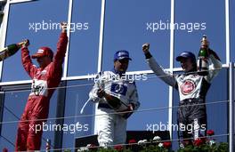 25.04.2004 Imola, San Marino, F1, Sunday, April, Michael Schumacher, GER, Ferrari with Juan-Pablo Montoya, COL, BMW WilliamsF1 and Jenson Button, GBR, BAR Honda - Podium, Formula 1 World Championship, Rd 4, San Marino Grand Prix, RSM