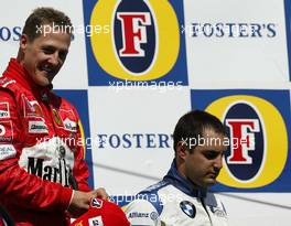 25.04.2004 Imola, San Marino, F1, Sunday, April, Michael Schumacher, GER, Ferrari and Juan-Pablo Montoya, COL, BMW WilliamsF1 - Podium, Formula 1 World Championship, Rd 4, San Marino Grand Prix, RSM