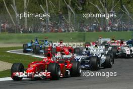 25.04.2004 Imola, San Marino, F1, Sunday, April, Michael Schumacher, GER, Ferrari, Juan-Pablo Montoya, COL, Juan Pablo, BMW WilliamsF1 Team, FW26, Action, Track - the start of the race, Formula 1 World Championship, race, Rd 4, San Marino Grand Prix, RSM