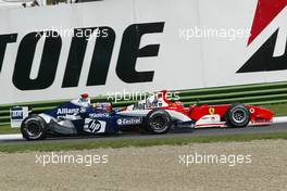 25.04.2004 Imola, San Marino, F1, Sunday, April, Juan-Pablo Montoya, COL, Juan Pablo, BMW WilliamsF1 Team, FW26, Action, Track  and Michael Schumacher, GER, Ferrari - Formula 1 World Championship, race, Rd 4, San Marino Grand Prix, RSM