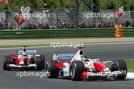 25.04.2004 Imola, San Marino, F1, Sunday, April, Cristiano da Matta, BRA, Panasonic Toyota Racing, TF104, Action, Track leads Olivier Panis, FRA, Toyota - Formula 1 World Championship, race, Rd 4, San Marino Grand Prix, RSM