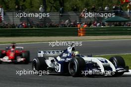 25.04.2004 Imola, San Marino, F1, Sunday, April, Ralf Schumacher, GER, BMW WilliamsF1 Team, FW26, Action, Track leads Rubens Barrichello, BRA, Scuderia Ferrari Marlboro, F2004, Action, Track - Formula 1 World Championship, race, Rd 4, San Marino Grand Prix, RSM