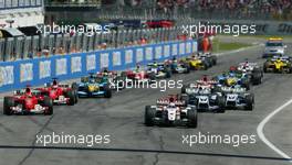 25.04.2004 Imola, San Marino, F1, Sunday, April, Jenson Button, GBR, BAR Honda, Michael Schumacher, GER, Ferrari, Ralf Schumacher, GER, BMW WilliamsF1, Juan-Pablo Montoya, COL, BMW WilliamsF1, Rubens Barrichello, BRA, Scuderia Ferrari Marlboro, F2004, Action, Track - the start of the race, Formula 1 World Championship, race, Rd 4, San Marino Grand Prix, RSM