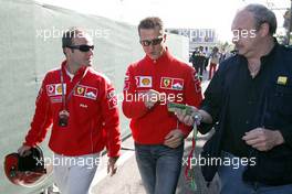 25.04.2004 Imola, San Marino, F1, Sunday, April, Rubens Barrichello, BRA, Ferrari and Michael Schumacher, GER, Ferrari arrive at the circuit - Formula 1 World Championship, Rd 4, San Marino Grand Prix, RSM