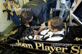 25.04.2004 Imola, San Marino, F1, Sunday, April, Gerhard Berger, AUT, Portrait, making some laps in a OLD Lotus F1 car, regarding of the accidents of Senna and Ratzemberger - Podium, Formula 1 World Championship, Rd 4, San Marino Grand Prix, RSM
