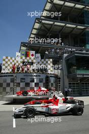 20.06.2004 Indianapolis, USA, F1, Sunday, June, Michael Schumacher, GER, Ferrari, Rubens Barrichello, BRA, Ferrari and Takuma Sato, JPN,  BAR Honda - Formula 1 World Championship, Rd 9, USA Grand Prix, Podium, USA