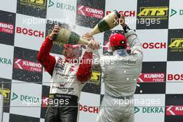 31.07.2004 Nürburg, Germany,  F3 Euro Series, Saturday, Podium, champaign for Nico Rosberg (FIN), Team Rosberg, Dallara F3-03 Opel (1st, left) and Lewis Hamilton (GBR), Manor Motorsport, Dallara F3-02 Mercedes (3rd, right) - F3 Euro Series 2004 at Nürburgring