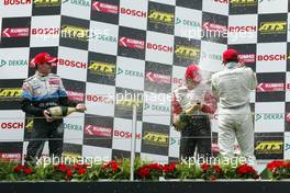 31.07.2004 Nürburg, Germany,  F3 Euro Series, Saturday, Podium, Jamie Green (GBR), ASM F3, Dallara F3-03 Mercedes (2nd, left) and Lewis Hamilton (GBR), Manor Motorsport, Dallara F3-02 Mercedes (3rd, right), giving race winner Nico Rosberg (FIN), Team Rosberg, Dallara F3-03 Opel (1st) - F3 Euro Series 2004 at Nürburgring