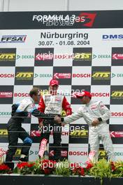 31.07.2004 Nürburg, Germany,  F3 Euro Series, Saturday, Podium, Nico Rosberg (FIN), Team Rosberg, Dallara F3-03 Opel (1st, center), Jamie Green (GBR), ASM F3, Dallara F3-03 Mercedes (2nd, left) and Lewis Hamilton (GBR), Manor Motorsport, Dallara F3-02 Mercedes (3rd, right) - F3 Euro Series 2004 at Nürburgring