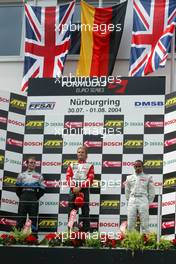 31.07.2004 Nürburg, Germany,  F3 Euro Series, Saturday, Podium, Nico Rosberg (FIN), Team Rosberg, Dallara F3-03 Opel (1st, center), Jamie Green (GBR), ASM F3, Dallara F3-03 Mercedes (2nd, left) and Lewis Hamilton (GBR), Manor Motorsport, Dallara F3-02 Mercedes (3rd, right) - F3 Euro Series 2004 at Nürburgring