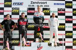 04.09.2004 Zandvoort, The Netherlands,  F3 Euro Series, Saturday, Podium, Eric Salignon (FRA), ASM F3, Dallara F3-03 Mercedes (1st, center), Nicolas Lapierre (FRA), OPEL Team Signature-Plus, Dallara F3-04 Opel (2nd, left), and Lewis Hamilton (GBR), Manor Motorsport, Dallara F3-02 Mercedes (3rd, right) - F3 Euro Series 2004 at Circuit Park Zandvoort