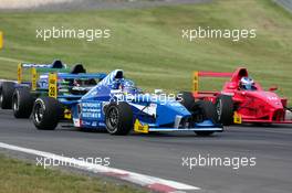 31.07.2004 Nürburg, Germany,  Formula BMW, Saturday, Michael Woller (GER), 4speed Media GmbH, fighting for position with Rene Rast (GER), KUG / DEWALT Racing, Dominik Tiroch (AUT), HBR Motorsport GmbH and Hanno Hess (GER) - Formula BMW 2004 at Lausitzring