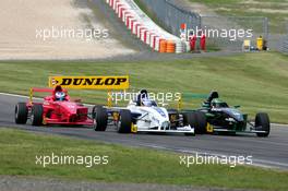 31.07.2004 Nürburg, Germany,  Formula BMW, Saturday, Fabio Onidi (ITA), Mücke Motorsport, Dominik Tiroch (AUT), HBR Motorsport GmbH and Rene Rast (GER), KUG / DEWALT Racing, fighting for position - Formula BMW 2004 at Lausitzring