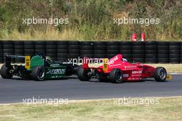 07.08.2004 Oschersleben, Germany,  Formula BMW, Saturday, Rene Rast (GER), KUG / DEWALT Racing and Dominik Tiroch (AUT), HBR Motorsport GmbH, fighting for position - Formula BMW 2004 at Motopark Oschersleben