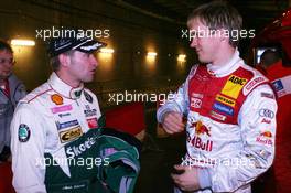 03.12.2004 Paris, France,  Friday, Armin Schwarz (GER), WRC driver, Team Skoda, Portrait (left) and Mattias Ekstrom (SWE), DTM driver, Team Abt-Audi, Portrait (right), chatting before the start of the free practice - 17th Race of Champions 2004, Stade de France, Paris, France