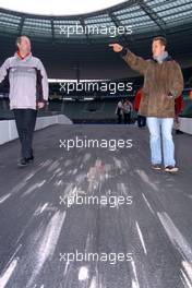 04.12.2004 Paris, France,  Saturday, Michael Schumacher (GER), F1 driver, Scuderia Ferrari, Portrait, inspecting the circuit with Marc Duez, Coordinator show - 17th Race of Champions 2004, Stade de France, Paris, France