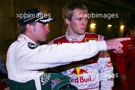 03.12.2004 Paris, France,  Friday, Armin Schwarz (GER), WRC driver, Team Skoda, Portrait (left) and Mattias Ekstrom (SWE), DTM driver, Team Abt-Audi, Portrait (right), chatting before the start of the free practice - 17th Race of Champions 2004, Stade de France, Paris, France