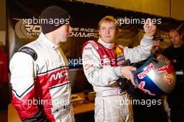 03.12.2004 Paris, France,  Friday, Mattias Ekstrom (SWE), DTM driver, Team Abt-Audi, Portrait (right), explaining what he experienced during his drive to Colin McRae (GBR), Rally driver, Team Nissan, Portrait (left) - 17th Race of Champions 2004, Stade de France, Paris, France