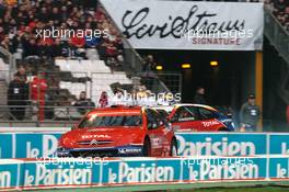 04.12.2004 Paris, France,  Saturday, A 1/4 final between Colin McRae (GBR), Rally driver, Team Nissan (front) and Mattias Ekstrom (SWE), DTM driver, Team Abt-Audi (rear), in the Citroen Xsara WRC - 17th Race of Champions 2004, Stade de France, Paris, France