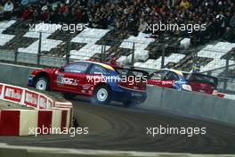 04.11.2004 Paris, France, Race of Champions at the Stade de France, Saturday, Colin McRae, SCO does battle with Mattias Ekstrom, SWE - Formel 1, Paris, France, December 2004