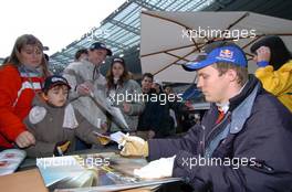 04.12.2004 Paris, France,  Saturday, Mattias Ekstrom (SWE), DTM driver, Team Abt-Audi, Portrait, signing autographs for fans - 17th Race of Champions 2004, Stade de France, Paris, France