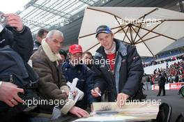 04.12.2004 Paris, France,  Saturday, Mattias Ekstrom (SWE), DTM driver, Team Abt-Audi, Portrait, signing autographs for fans - 17th Race of Champions 2004, Stade de France, Paris, France