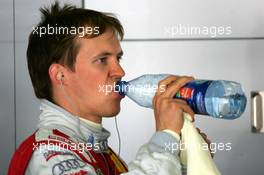 03.06.2005 Brno, Czech Republic,  Mattias Ekström (SWE), Audi Sport Team Abt Sportsline, Portrait, drinking from a bottle of water - DTM 2005 at Automotodrom Brno, Czech Republic (Deutsche Tourenwagen Masters)