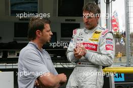 04.06.2005 Brno, Czech Republic,  Bernd Schneider (GER), Vodafone AMG-Mercedes, Portrait, with his race engineer - DTM 2005 at Automotodrom Brno, Czech Republic (Deutsche Tourenwagen Masters)