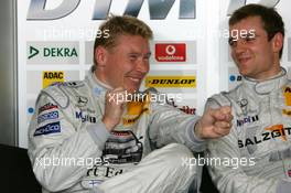 04.06.2005 Brno, Czech Republic,  Mika Häkkinen (FIN), Sport Edition AMG-Mercedes, Portrait, happy with keeping pole position after the run of Manuel Reuter - DTM 2005 at Automotodrom Brno, Czech Republic (Deutsche Tourenwagen Masters)