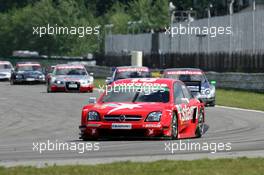 05.06.2005 Brno, Czech Republic,  Heinz-Harald Frentzen (GER), Opel Performance Center, Opel Vectra GTS V8, leading the race, in front of Gary Paffett (GBR), DaimlerChrysler Bank AMG-Mercedes, AMG-Mercedes C-Klasse and Mattias Ekström (SWE), Audi Sport Team Abt Sportsline, Audi A4 DTM - DTM 2005 at Automotodrom Brno, Czech Republic (Deutsche Tourenwagen Masters)