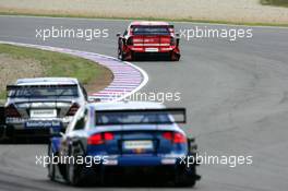 05.06.2005 Brno, Czech Republic,  Heinz-Harald Frentzen (GER), Opel Performance Center, Opel Vectra GTS V8, leading in front of Gary Paffett (GBR), DaimlerChrysler Bank AMG-Mercedes, AMG-Mercedes C-Klasse, and Mattias Ekström (SWE), Audi Sport Team Abt Sportsline, Audi A4 DTM - DTM 2005 at Automotodrom Brno, Czech Republic (Deutsche Tourenwagen Masters)