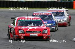 05.06.2005 Brno, Czech Republic,  Heinz-Harald Frentzen (GER), Opel Performance Center, Opel Vectra GTS V8, leading the race in front of Mattias Ekström (SWE), Audi Sport Team Abt Sportsline, Audi A4 DTM and Tom Kristensen (DNK), Audi Sport Team Abt, Audi A4 DTM - DTM 2005 at Automotodrom Brno, Czech Republic (Deutsche Tourenwagen Masters)