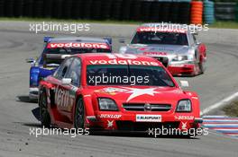 05.06.2005 Brno, Czech Republic,  Heinz-Harald Frentzen (GER), Opel Performance Center, Opel Vectra GTS V8, leads Mattias Ekström (SWE), Audi Sport Team Abt Sportsline, Audi A4 DTM and Tom Kristensen (DNK), Audi Sport Team Abt, Audi A4 DTM - DTM 2005 at Automotodrom Brno, Czech Republic (Deutsche Tourenwagen Masters)